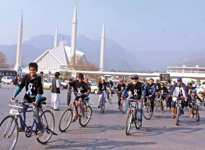 people take part in white ribbon cycle rally held to create awareness about violence against women photo waseem nazir express people take part in white ribbon cycle rally held to create awareness about violence against women photo waseem nazir express