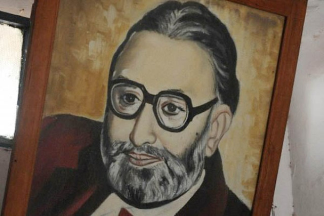 to go with pakistan religion minority science nobel feature by waqar hussain this picture taken on july 13 2012 shows a worker cleaning the portrait of pakistan s only nobel laureate professor abdus salam at the state run school where he received his early education in the town of jhang 300 kilometers southwest of islamabad the two room bungalow the birth place of pakistan s only nobel laureate today stands empty testament to the indifference bigotry and prejudice surrounding the country s greatest scientist afp photo arif ali afp photo arif ali to go with pakistan religion minority science nobel feature by waqar hussain this picture taken on july 13 2012 shows a worker cleaning the portrait of pakistan s only nobel laureate professor abdus salam at the state run school where he received his early education in the town of jhang 300 kilometers southwest of islamabad the two room bungalow the birth place of pakistan s only nobel laureate today stands empty testament to the indifference bigotry and prejudice surrounding the country s greatest scientist afp photo arif ali afp photo arif ali
