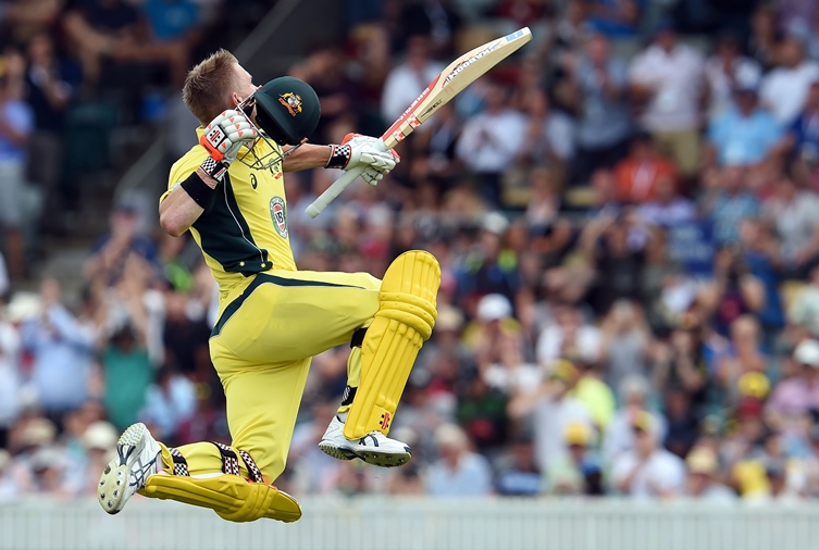 australia 039 s batsman david warner celebrates his 100 runs during the second game of the one day international cricket series between australia and new zealand in canberra on december 6 2016 photo afp