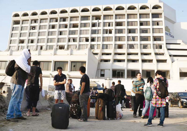 guests pictured standing outside regent plaza after being safely evacuated from the fire which broke out early monday morning photo online guests pictured standing outside regent plaza after being safely evacuated from the fire which broke out early monday morning photo online