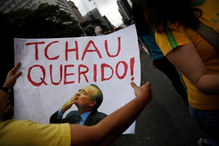 a man holds a sign that reads quot bye darling quot in reference to brazil 039 s senate president renan calheiros as he takes part in a protest against corruption at paulista avenue in sao paulo brazil december 4 2016 photo reuters