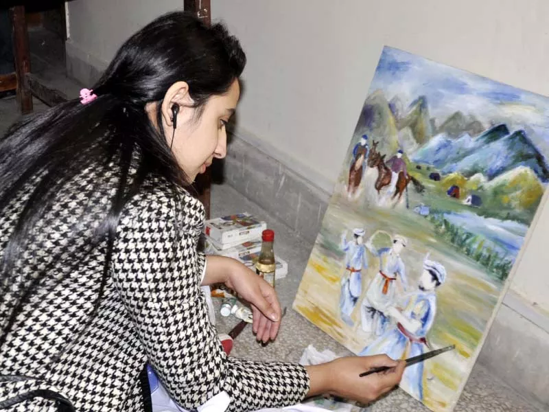 participants work their brushes photo muhammad javaid express participants work their brushes photo muhammad javaid express