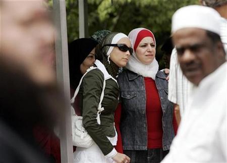 muslim women stand outside the islamic center of passaic county after friday prayers in paterson new jersey july 13 2007 photo reuters