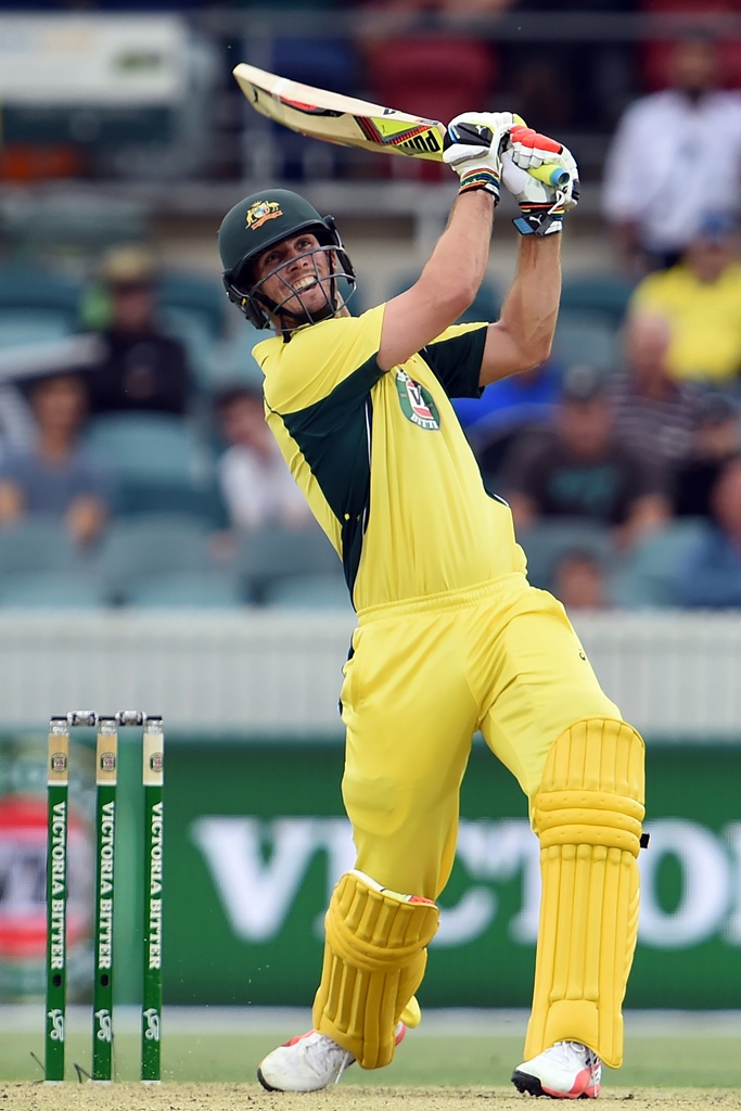 mitchell marsh executes a hit over the boundary for six runs in canberra on december 6 2016 photo afp