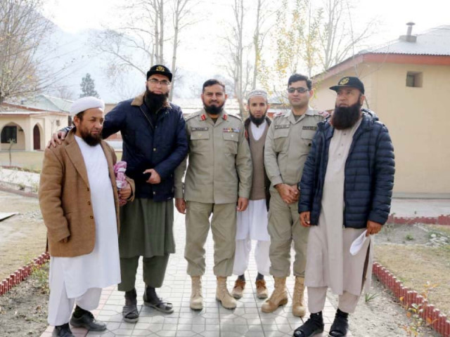 before boarding the flight junaid jamshed along with former cricketer saeed anwar met officers at the chitral scouts officers mess photo qaiser butt express before boarding the flight junaid jamshed along with former cricketer saeed anwar met officers at the chitral scouts officers mess photo qaiser butt express