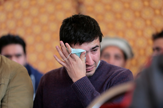 relatives grieve as they wait for word on the collection of the remains of victims of the pakistan international airlines pia plane crash at pims hospital in islamabad photo reuters