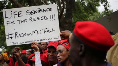 white south african men accused of forcing black man into coffin denied bail