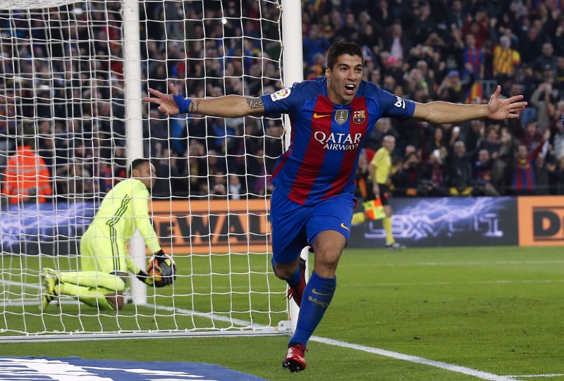 luis suarez celebrates after scoring barcelona 039 s goal against real madrid photo reuters albert gea