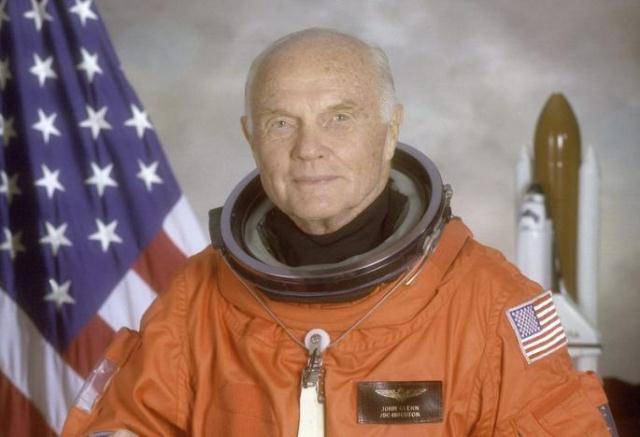 sts 95 crewmember astronaut and u s senator john glenn poses for his official nasa photo taken april 14 1998 photo reuters