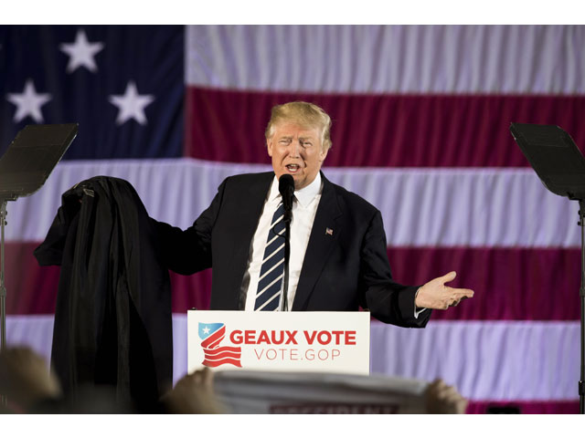 president elect donald trump speaks at the dow chemical hangar december 9 2016 in baton rouge louisiana photo afp