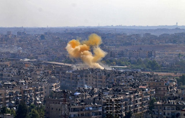 smoke rises from reported opposition fire from buildings in an eastern government held neighbourhood of the northern syrian city of aleppo on october 20 2016 as clashes erupted in an area designated as a humanitarian corridor for civilians to leave the embattles city an afp journalist said despite an announced pause in the syrian army 039 s russian backed offensive photo afp