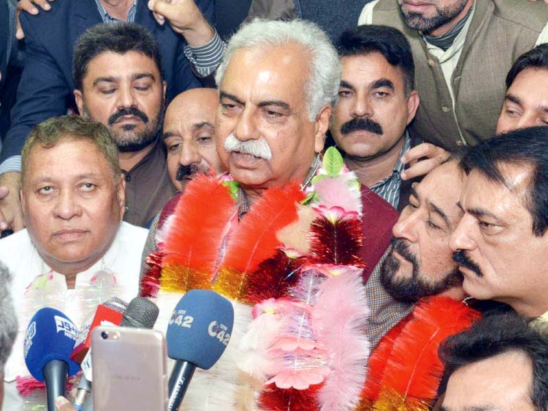 col retd mubashar javaid speaks to reporters after his election photo express