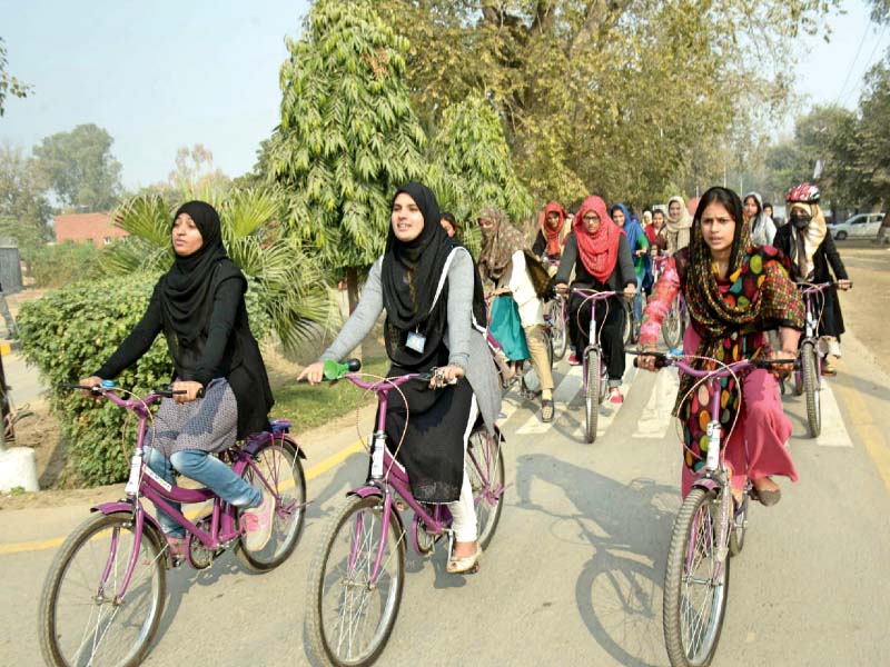 women cycle around faisalabad against gender violence