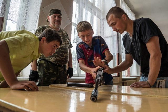 the drills in the town of marinka are held every month since the conflict broke out with pro russian insurgents photo afp the drills in the town of marinka are held every month since the conflict broke out with pro russian insurgents photo afp