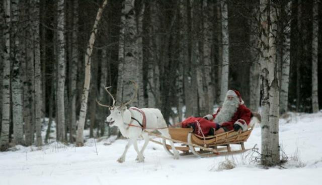 a man dressed as santa claus rides his sleigh as he prepares for christmas on the arctic circle in rovaniemi northern finland december 19 2007 photo reuters a man dressed as santa claus rides his sleigh as he prepares for christmas on the arctic circle in rovaniemi northern finland december 19 2007 photo reuters