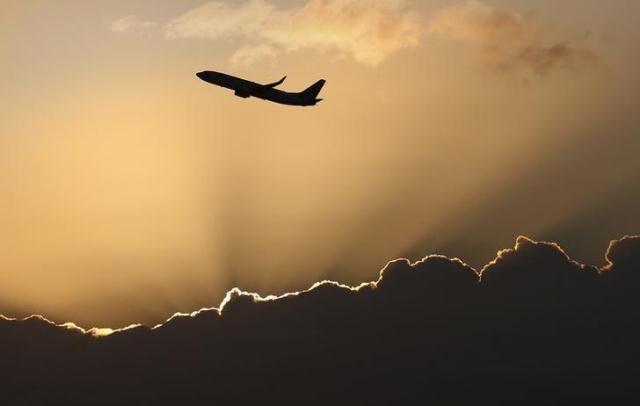 a virgin australia airlines 737 aircraft takes off at sunrise from sydney international airport april 1 2016 photo reuters