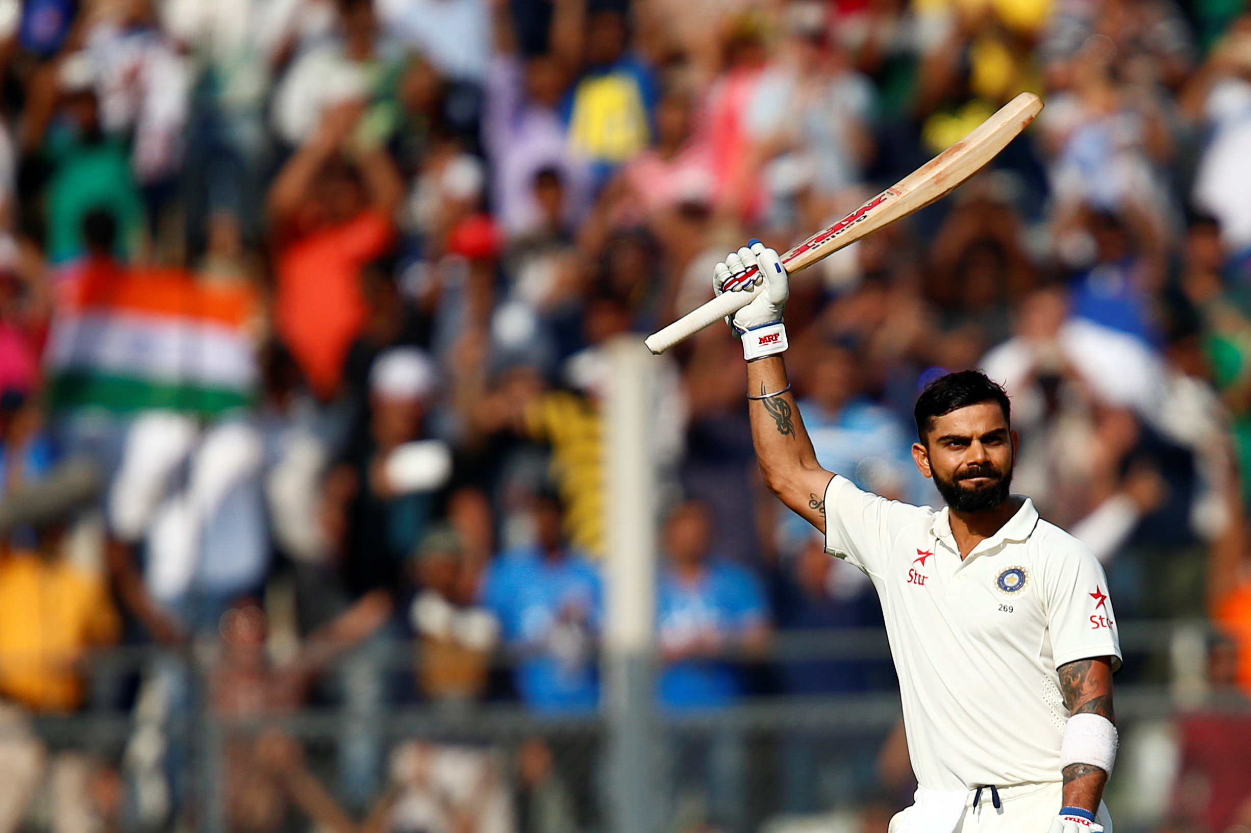 virat kohli celebrates his century against england in the fourth test at wankhede stadium in mumbai on december 10 2016 photo reuters