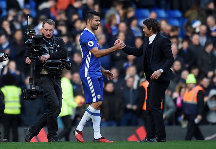 chelsea manager antonio conte celebrates after the game against west brom with striker diego costa on december 11 2016 photo reuters