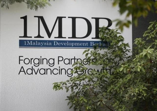 jho low family 039 s move to claim assets rejected by u s court foliage partly covers a 1 malaysia development berhad 1mdb billboard at the funds flagship photo reuters jho low family 039 s move to claim assets rejected by u s court foliage partly covers a 1 malaysia development berhad 1mdb billboard at the funds flagship photo reuters