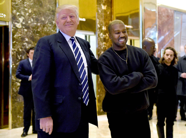 singer kanye west and president elect donald trump speak with the press after their meetings at trump tower december 13 2016 in new york photo afp