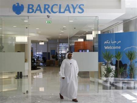 a man uses walks out of a barclays bank branch in dubai november 5 2008 reuters ahmed jadallah