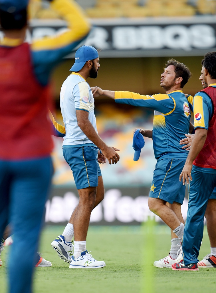 pakistani players yasir shah r and paceman wahab riaz c confront each other during a football game in the team 039 s training session at gabba in brisbane photo afp