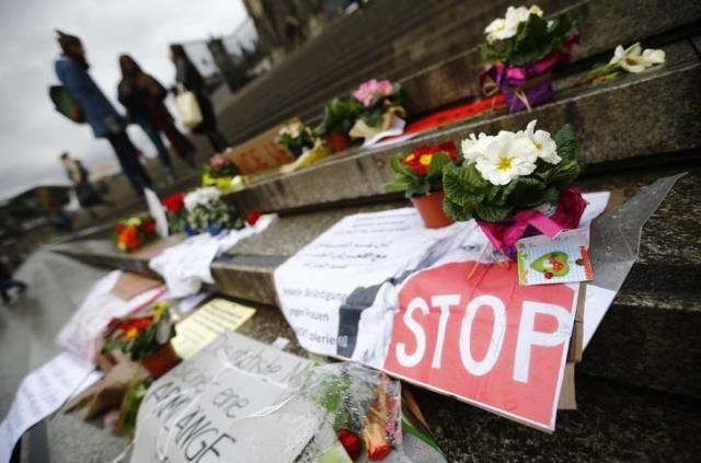 flowers and posters are placed in the square between the city cathedral and the railway station in cologne germany january 11 2016 where the vast majority of dozens of new year eve assaults on women took place photo reuters flowers and posters are placed in the square between the city cathedral and the railway station in cologne germany january 11 2016 where the vast majority of dozens of new year eve assaults on women took place photo reuters