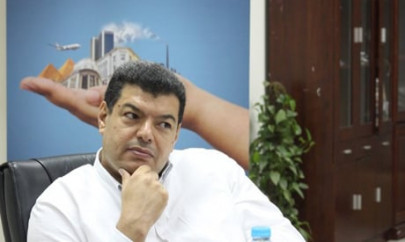 egypt freezes assets of media company chairman