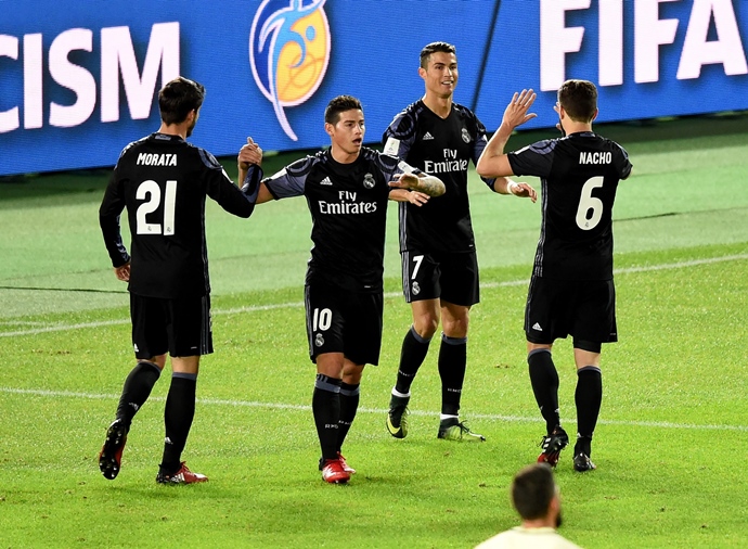 real madrid 039 s forward cristiano ronaldo 2nd r is congratulated by teammates alvaro morata 21 james rodriguez 2nd l and nacho fernande 6 after scoring a goal during the club world cup semi final football match between mexico 039 s club america and spain 039 s real madrid at yokohama international stadium in yokohama on december 15 2016 photo afp