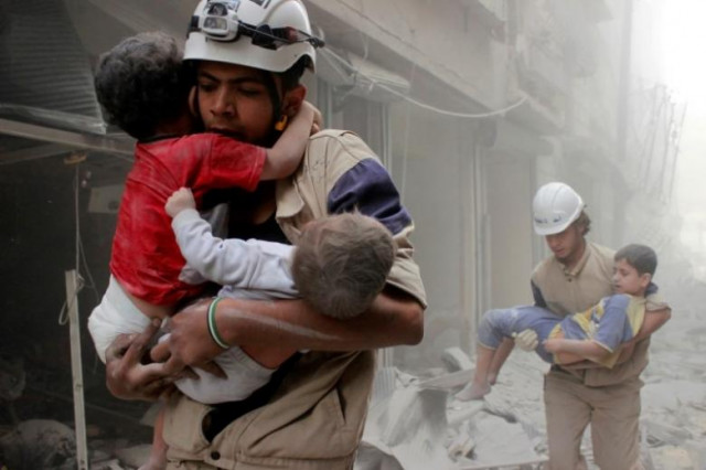 members of the civil defence rescue children after what activists said was an air strike by forces loyal to syria 039 s president bashar al assad in al shaar neighbourhood of aleppo syria june 2 2014 reuters sultan kitaz file photo members of the civil defence rescue children after what activists said was an air strike by forces loyal to syria 039 s president bashar al assad in al shaar neighbourhood of aleppo syria june 2 2014 reuters sultan kitaz file photo