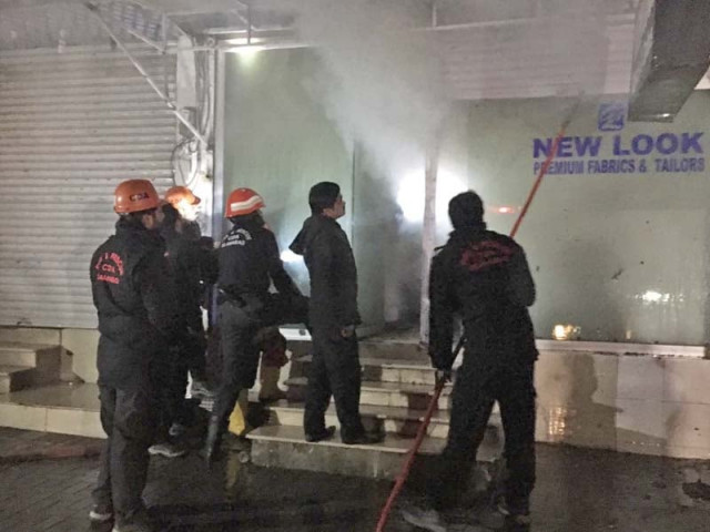firefighters try to control the blaze that gutted a garment shop in melody market photo mudassar raja express firefighters try to control the blaze that gutted a garment shop in melody market photo mudassar raja express