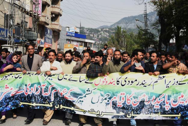 a file photo of kashmiris protesting against the visit of indian prime minister modi photo file a file photo of kashmiris protesting against the visit of indian prime minister modi photo file