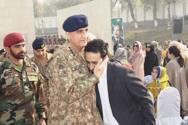 gen qamar consoles a relative of an aps attack victim photo inp gen qamar consoles a relative of an aps attack victim photo inp