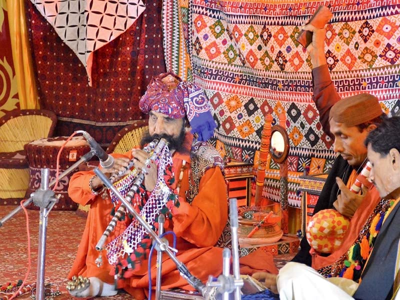 the guests were enthralled by sindhi folk songs that were played on traditional alghoza photo express