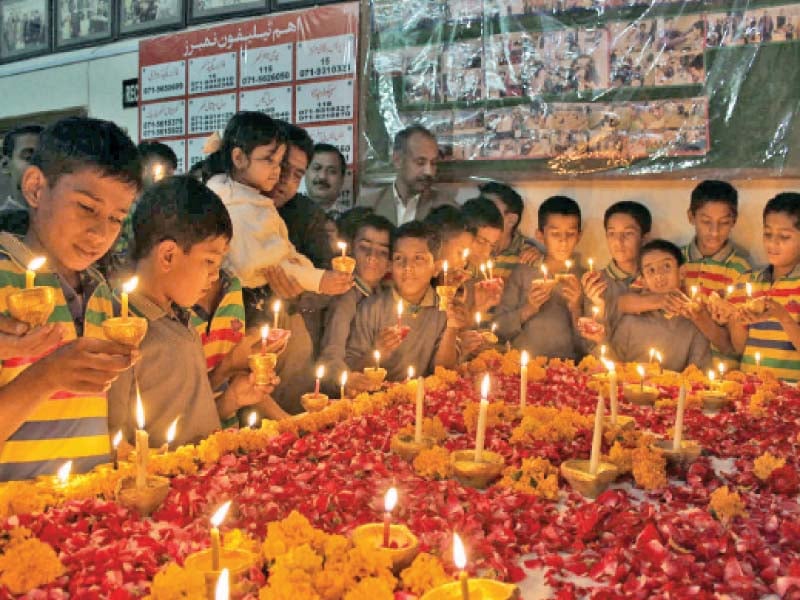 the residents of the orphanage lit candles displayed pictures of the aps martyrs and offered prayers photo express