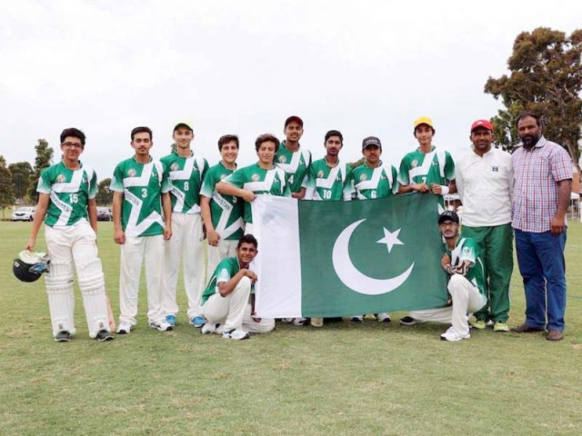 nauman holding the left corner of the flag poses with teammates photo express nauman holding the left corner of the flag poses with teammates photo express