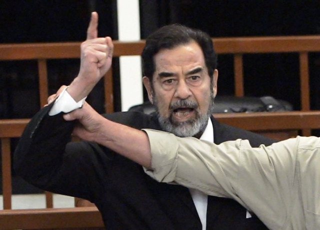 a november 5 2006 file photo of former iraqi president saddam hussein shouting at the court as a bailiff attempts to silence him during the delivery of his verdict in his trial photo afp a november 5 2006 file photo of former iraqi president saddam hussein shouting at the court as a bailiff attempts to silence him during the delivery of his verdict in his trial photo afp