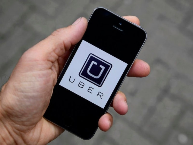the deal will give uber access to express 039 s fleet of more than 11 000 taxis and 17 000 drivers photo reuters the deal will give uber access to express 039 s fleet of more than 11 000 taxis and 17 000 drivers photo reuters