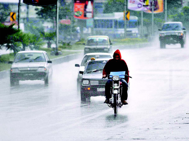 motorists swish over the wet road in islamabad on monday intermittent rain continued throughout yesterday photo app