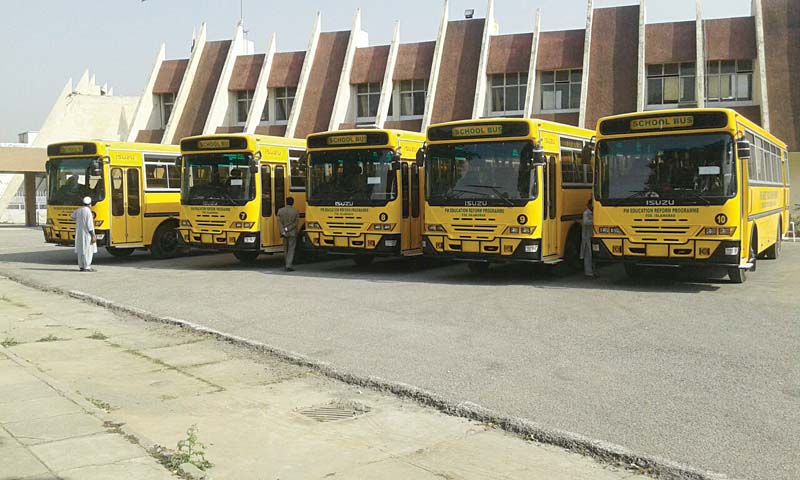 five of the buses parked at a local college photo express