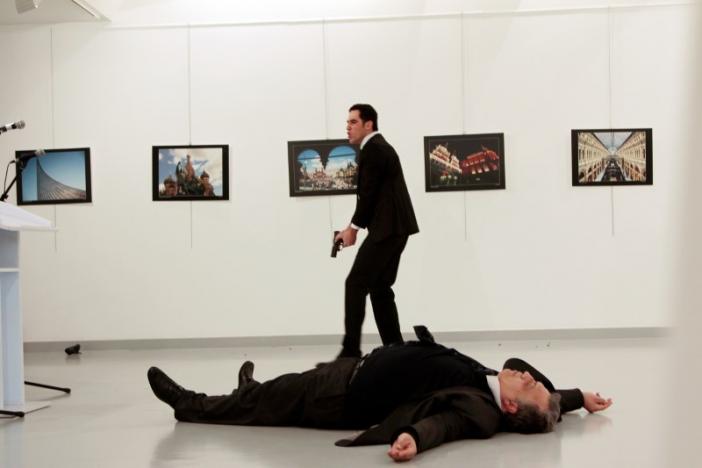 russian ambassador to turkey andrei karlov lies on the ground after he was shot by mevlut mert altintas at an art gallery in ankara turkey hasim kilic hurriyet via reuters