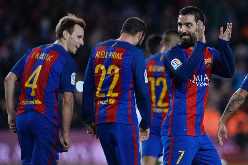 hat trick hero arda turan assumed the scoring mantle in the absence of lionel messi neymar and luis suarez with the turk 039 s three goals putting hercules to the sword photo afp