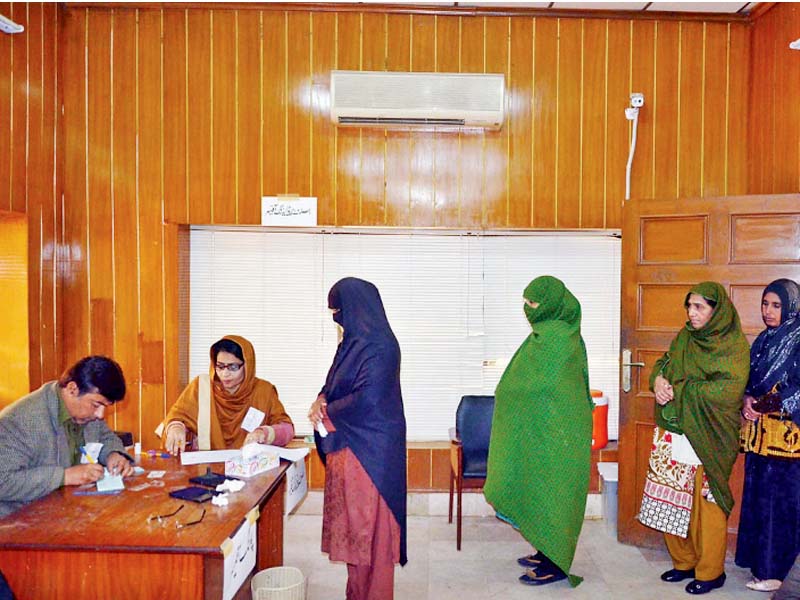 heads of union councils line up to cast their votes to elect the attock district council chairman photo online