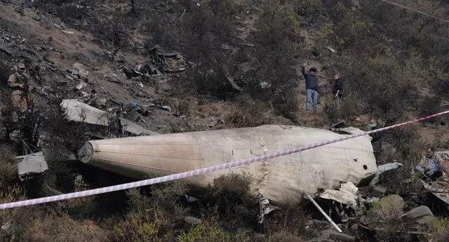 relatives of pk 661 victims from chitral claim govt prioritised notable victims photo afp relatives of pk 661 victims from chitral claim govt prioritised notable victims photo afp