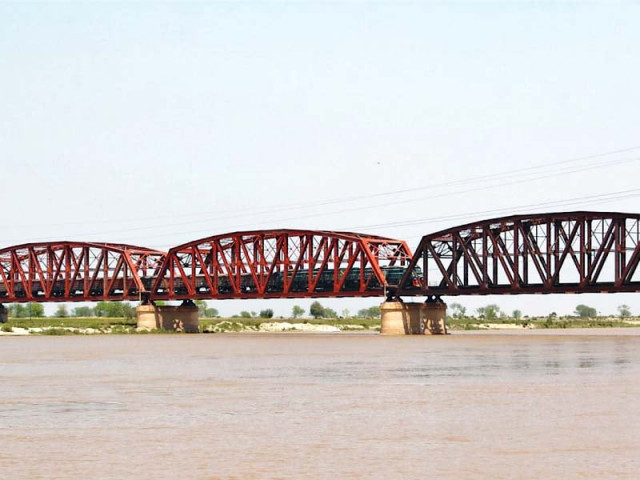 a train passes on the decades old bridge over the sutlej river photo kashif zafar express file a train passes on the decades old bridge over the sutlej river photo kashif zafar express file
