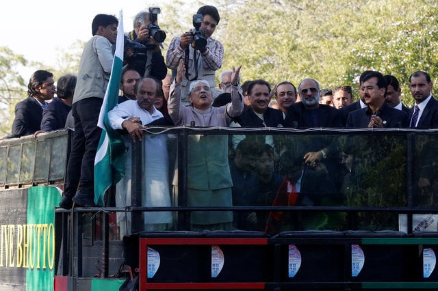 asif ali zardari c in traditional cap former president of pakistan and co chairman of pakistan people 039 s party ppp political party gestures to his supporters after returning from dubai at the airport 039 s old jinnah terminal in karachi pakistan december 23 2016 photo reuters asif ali zardari c in traditional cap former president of pakistan and co chairman of pakistan people 039 s party ppp political party gestures to his supporters after returning from dubai at the airport 039 s old jinnah terminal in karachi pakistan december 23 2016 photo reuters