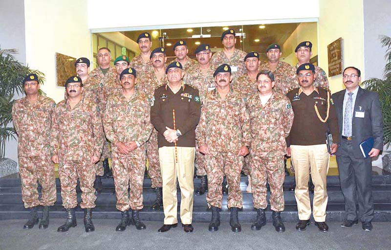 army chief gen qamar in a group photograph during his visit to the ispr headquarters in rawalpindi photo app