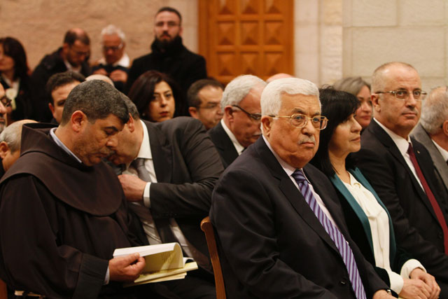 palestinian president mahmoud abbas attends the christmas midnight mass in saint catherine 039 s church at the church of the nativity where christians believe the virgin mary gave birth to jesus christ in the adjacent church of the nativity on december 25 2016 in bethlehem west bank photo afp