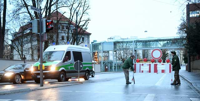 policemen place a road block in augsburg southern germany on december 25 2016 around 54 000 residents are being evacuated from their homes it is germany 039 s biggest evacuation for an unexploded bomb since the end of the world war two the lettering reads quot danger zone do not enter quot photo afp