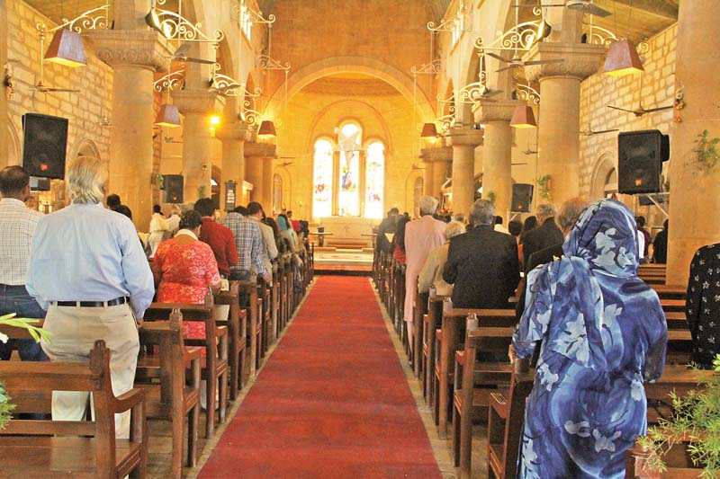 a large number of families dressed up in colourful clothes attended prayers at the holy trinity cathedral on christmas day photos ayesha mir express